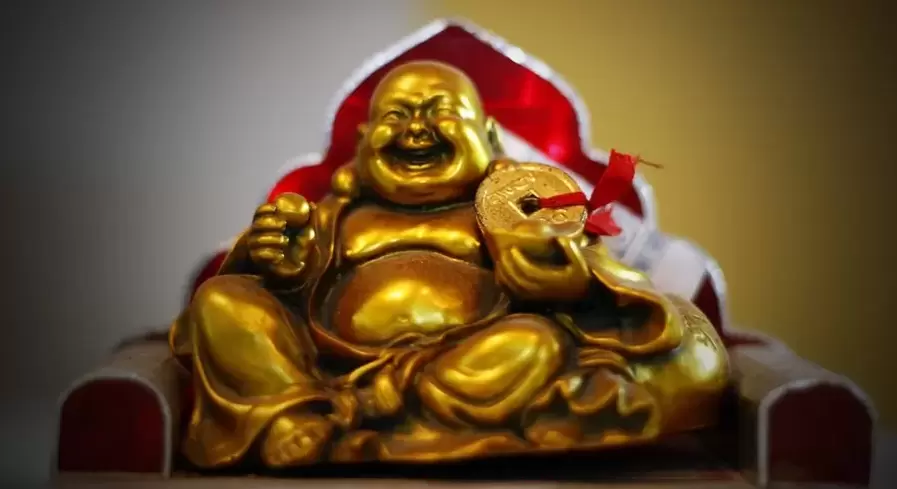 omad tumor - kulayotgan Budda